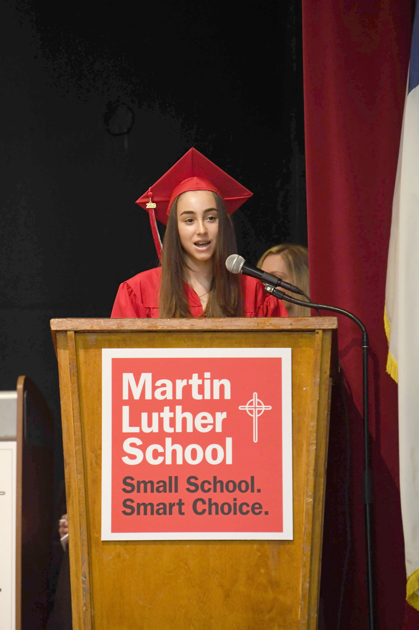 Student speaking at her graduation